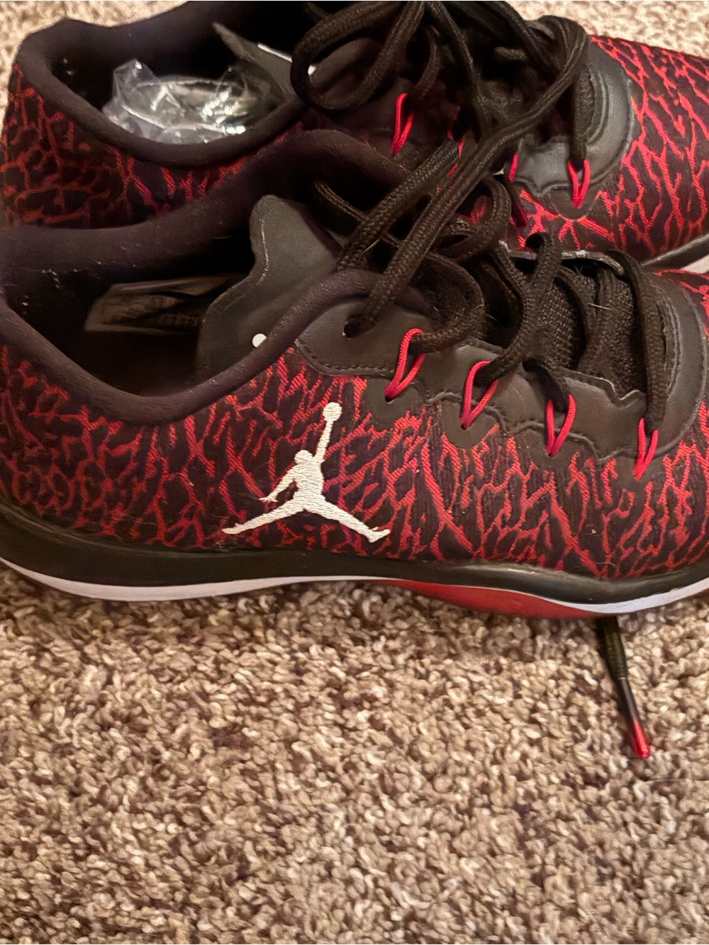 Women’s size 6 Nike Black and Red Low-Top Basketball Sneakers